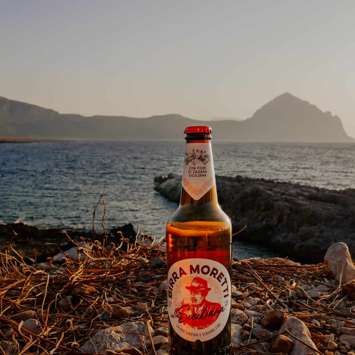 Bierflasche am Strand - Filmproduktion hawkins.film